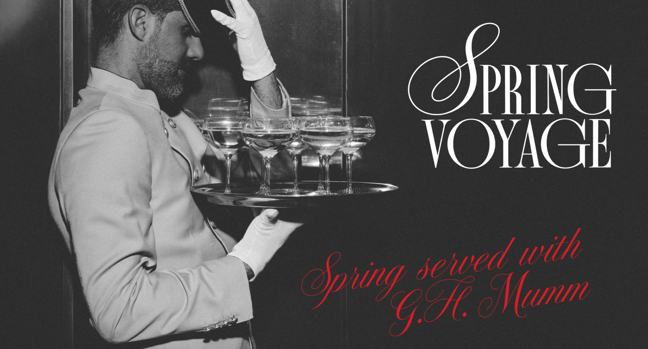 Black-and-white photo of a gloved server holding a tray of glasses beside “SPRING VOYAGE” and red script text.